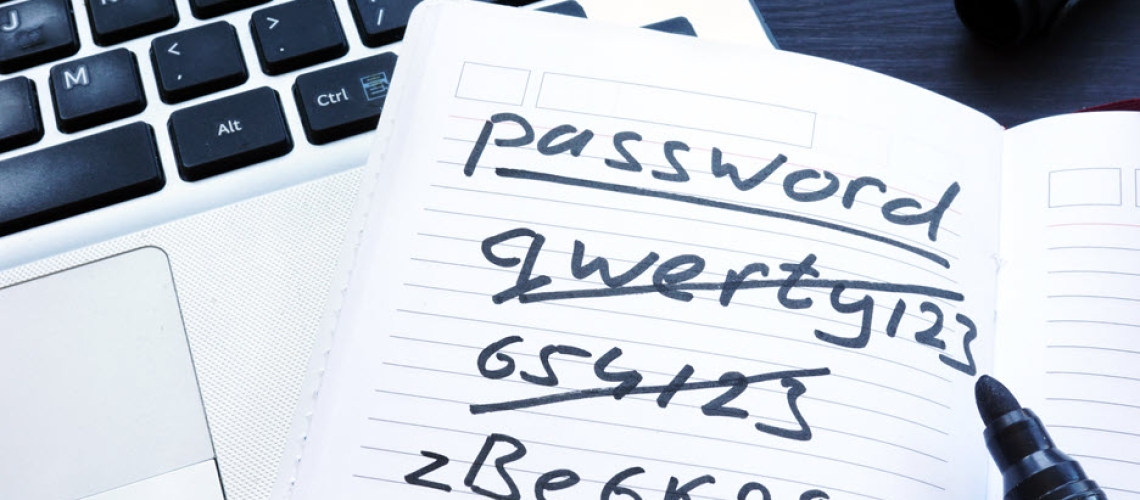 handwritten passwords in a password notebook.