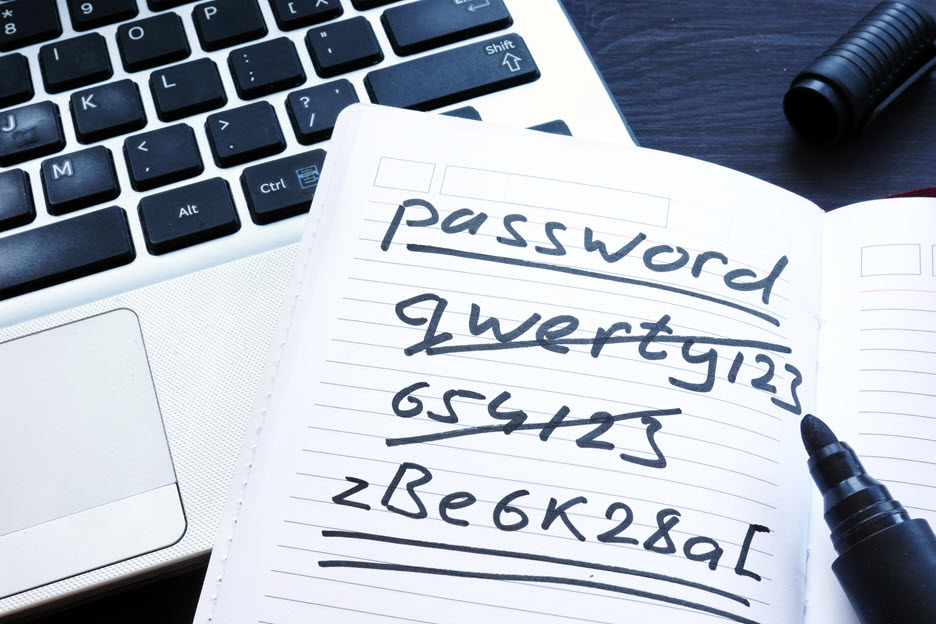 handwritten passwords in a password notebook.